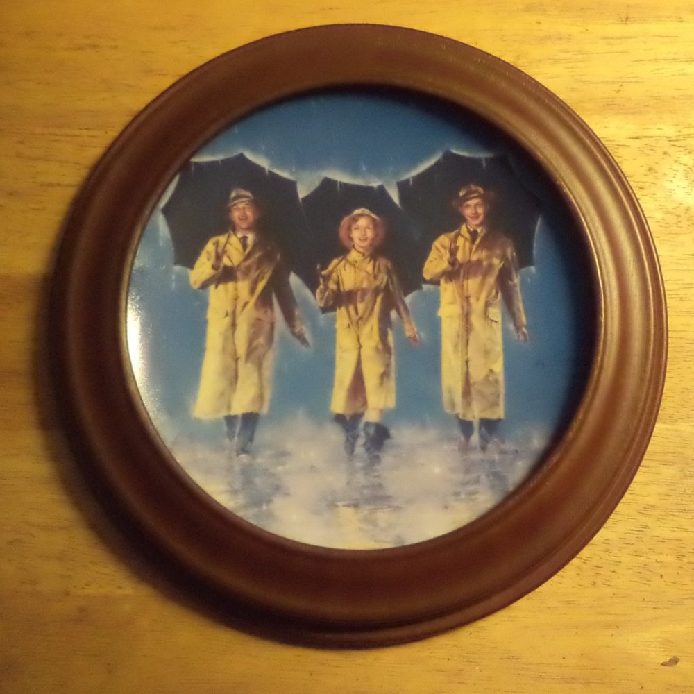 Framed Edwin Knowles "we're happy again" plate.